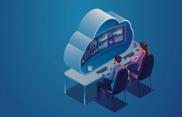 Team implementing FinOps best practices at workstations integrated within a cloud structure, symbolizing cloud FinOps management